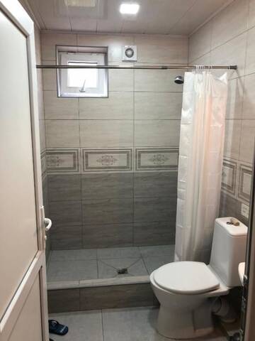 Фото номера Четырехместный номер Гостевой дом Udabno My home г. Удабно 27
